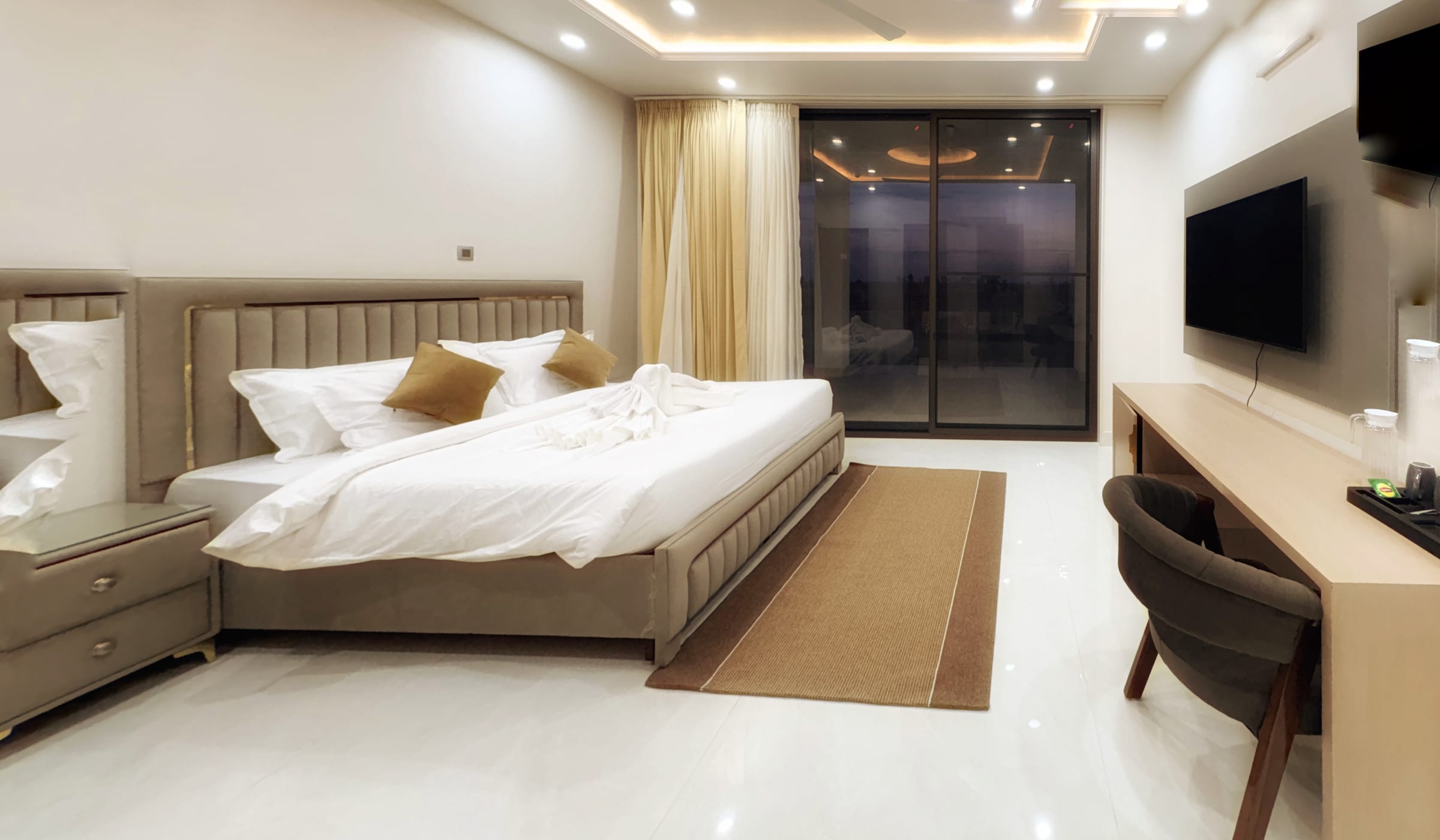 The Master Suite — a spacious king room with a private balcony